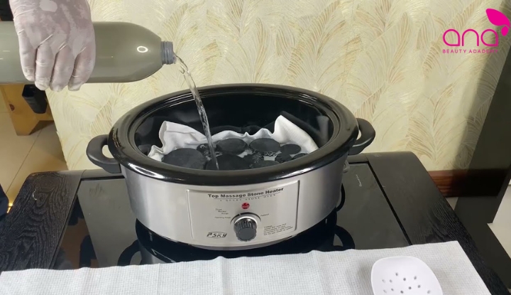Làm nóng đá massage
